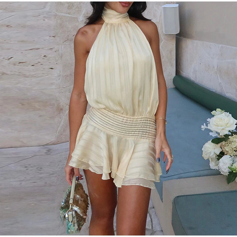 Abril - Vestido con volantes y cuello halter